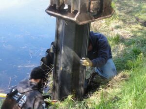 installing the pilings for a steel seawall