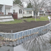 70' x 2.5 new wall in Pinckney, MI off canal leading to Portage, Lake