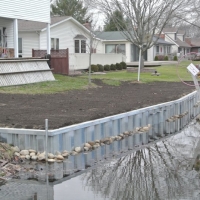 70' x 2.5 new wall in Pinckney, MI off canal leading to Portage, Lake