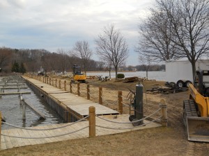 Custom boardwalk being installed in Waterford on Cass Lake in Oakland County Michigan.