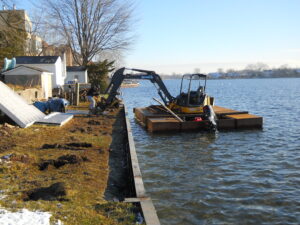 Galvanized steel seawall installation on Sylvan Lake_Waterford_MI