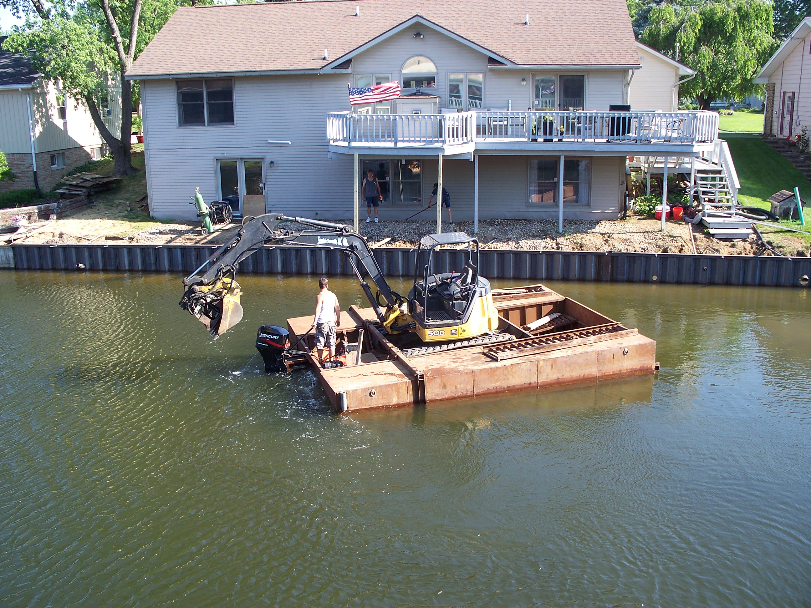 excavator on a barge in Eaton County MI