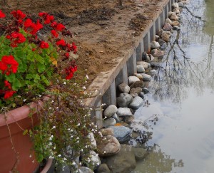 michigan fieldstone riprap against galvanized steel seawall