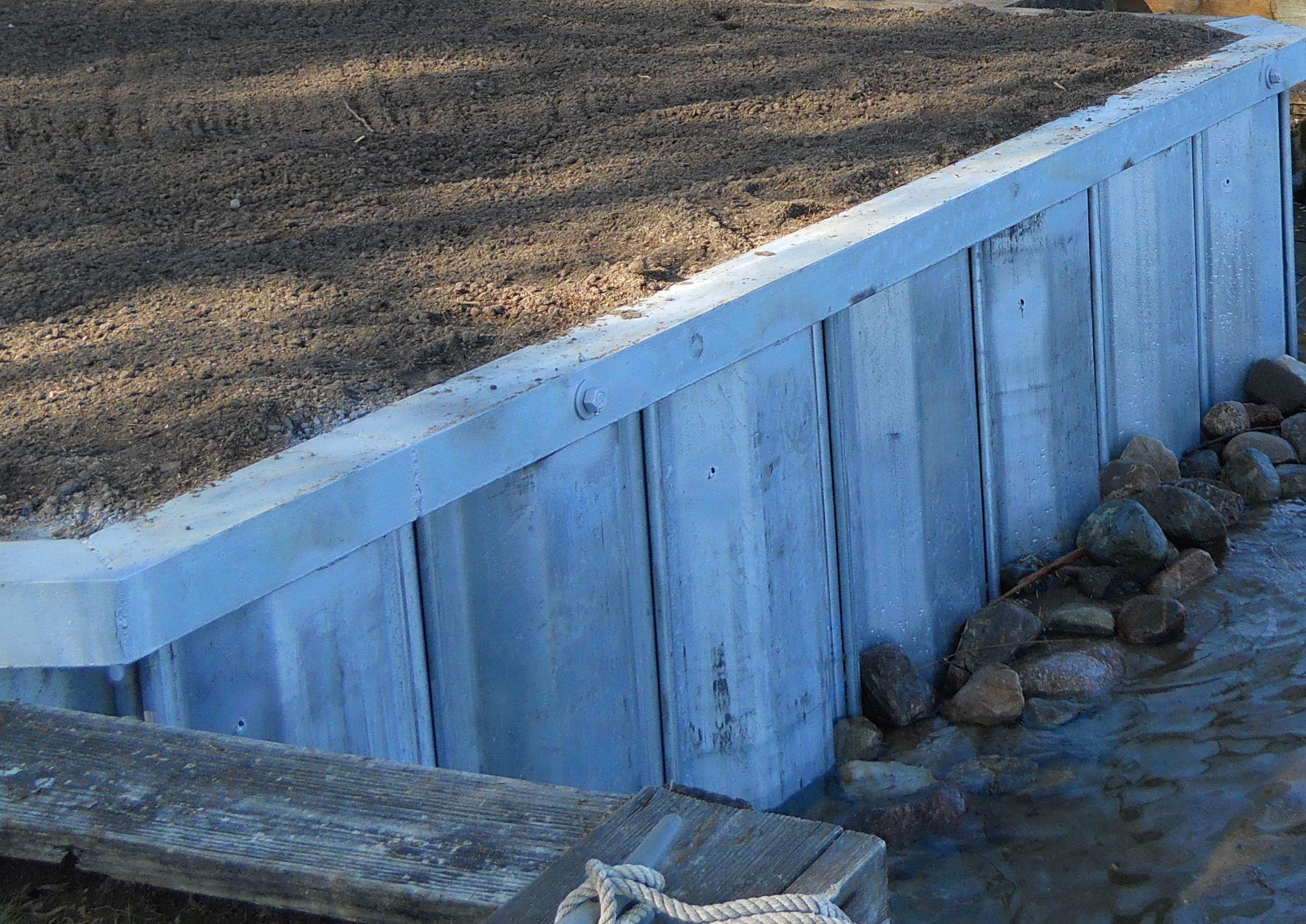 steel seawall built on brighton lake michigan