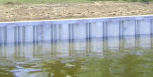 steel seawall on Strawberry Lake in Livingston County Michigan